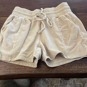 All yoga tan shorts size small